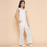 White cotton schiffli embroidered cuff sleeve top and elasticated pant girls set, self-designed Indian kurta with bottomwear on display